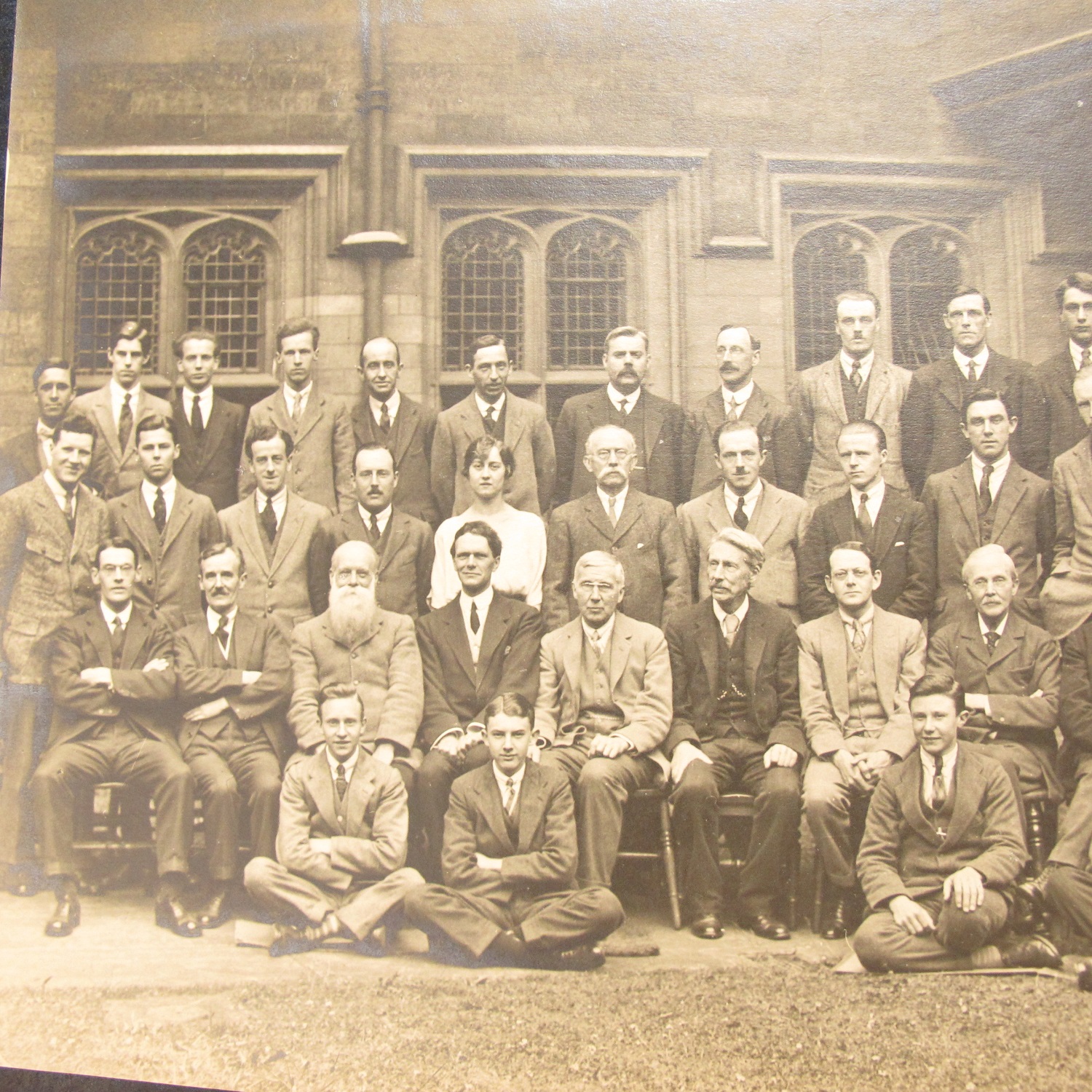 Formal staff photograph taken in one of the Library courtyards, 1923