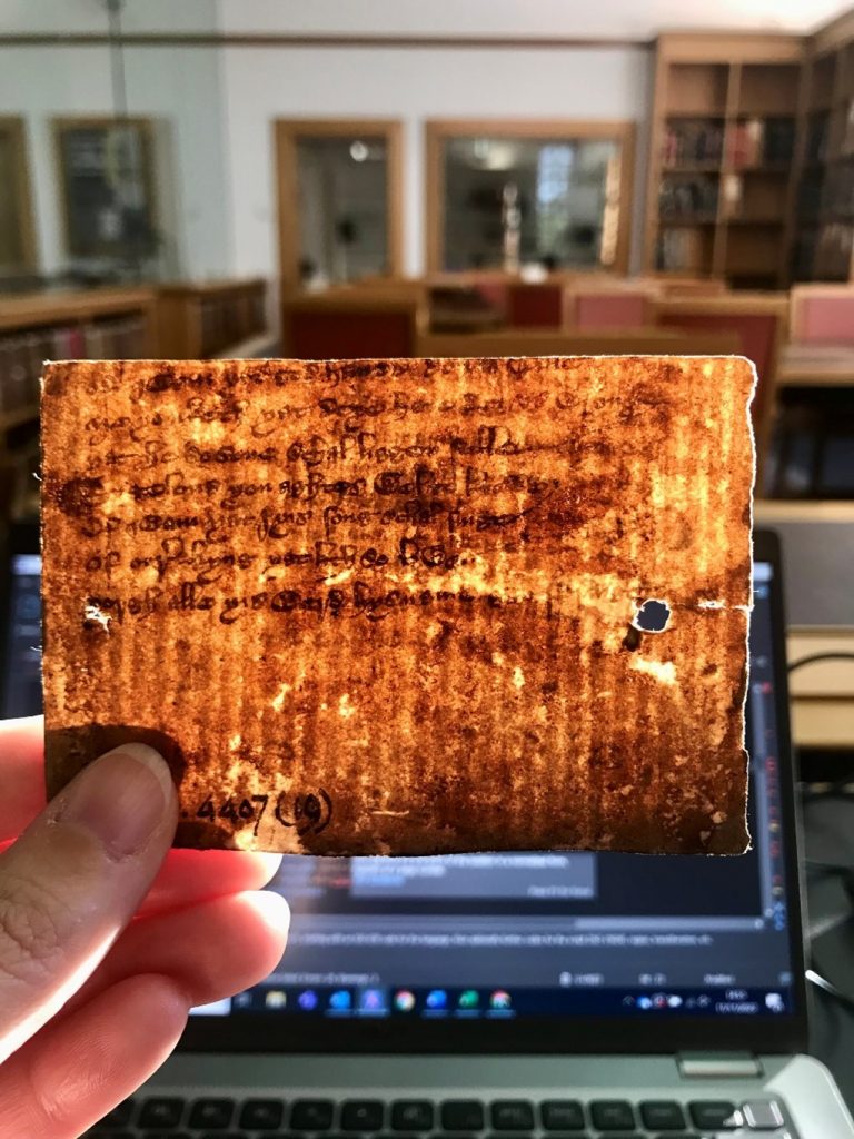 One of the four fragments of Middle English poetry that comprise MS Add. 4407 (19) being lit by the afternoon sun in the Manuscripts Reading Room.