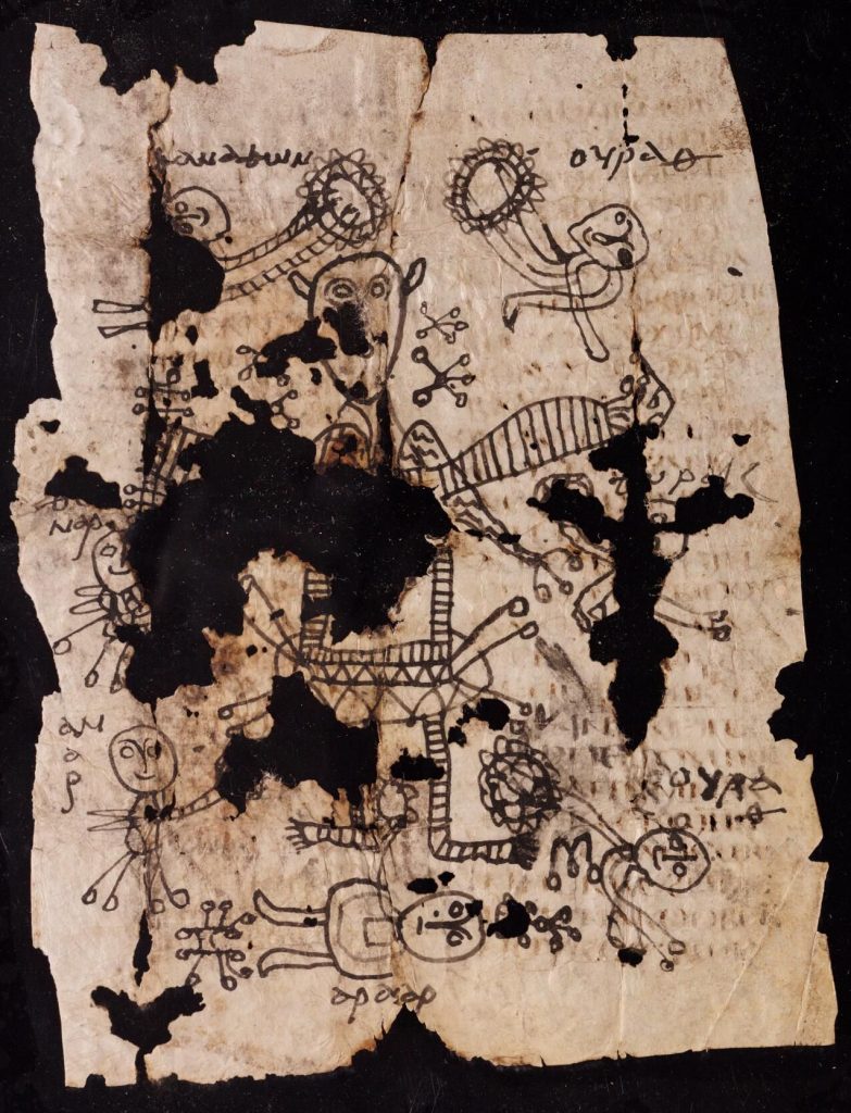 Palimpsest text with magical drawings
